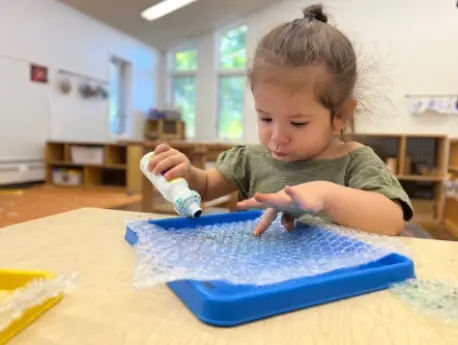 Girl Trying to Paint